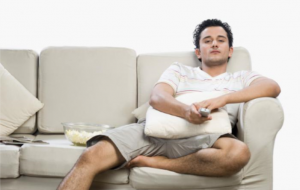 man sitting on couch